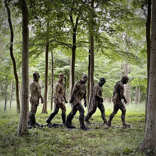 Walking Men in forest