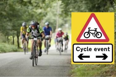 cycles with event roadsign